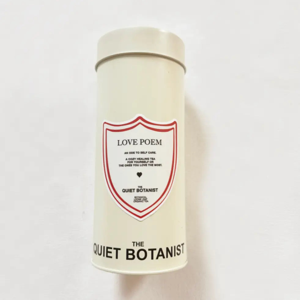 White cylindrical container with red and black text on a white background