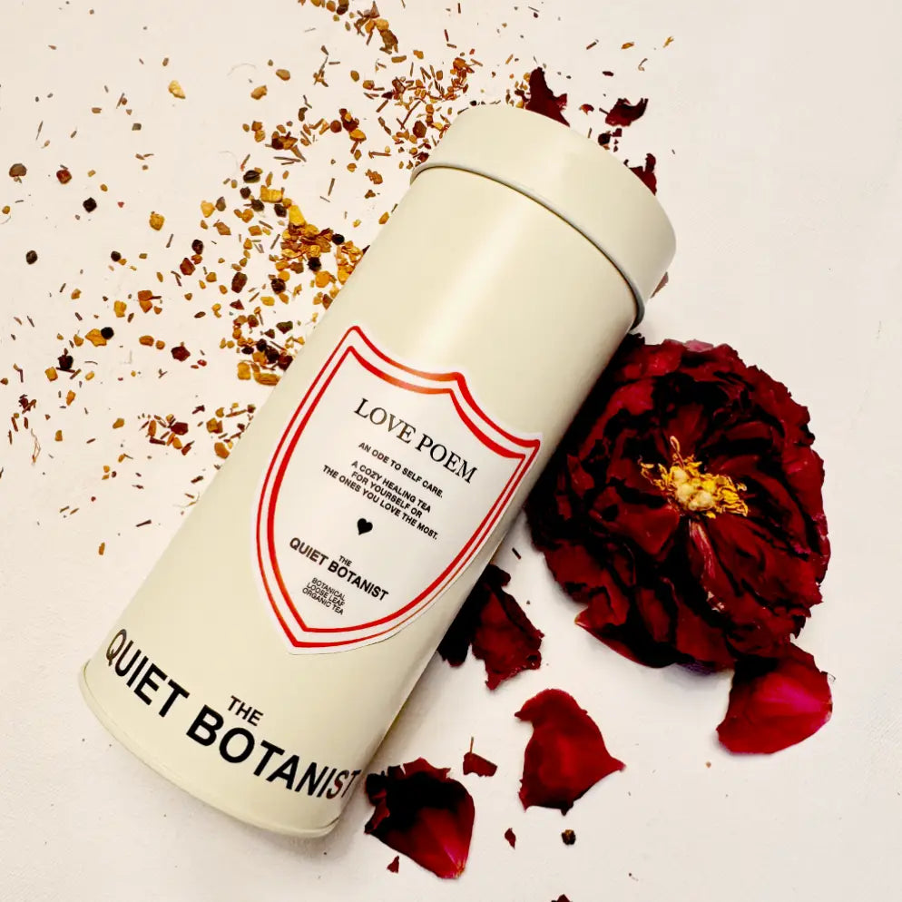 White cylindrical container with red and black text on a white background