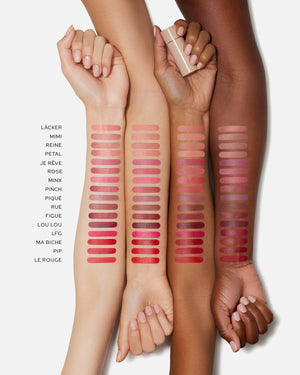 Three arms with lipstick swatches on a white background
