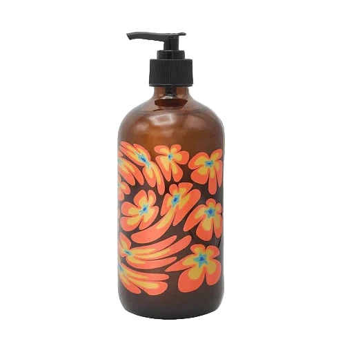 Brown bottle with colorful floral design and pump on a white background