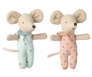 Two plush mouse toys, one in a star-patterned outfit and the other in a polka dot outfit, on a white background.