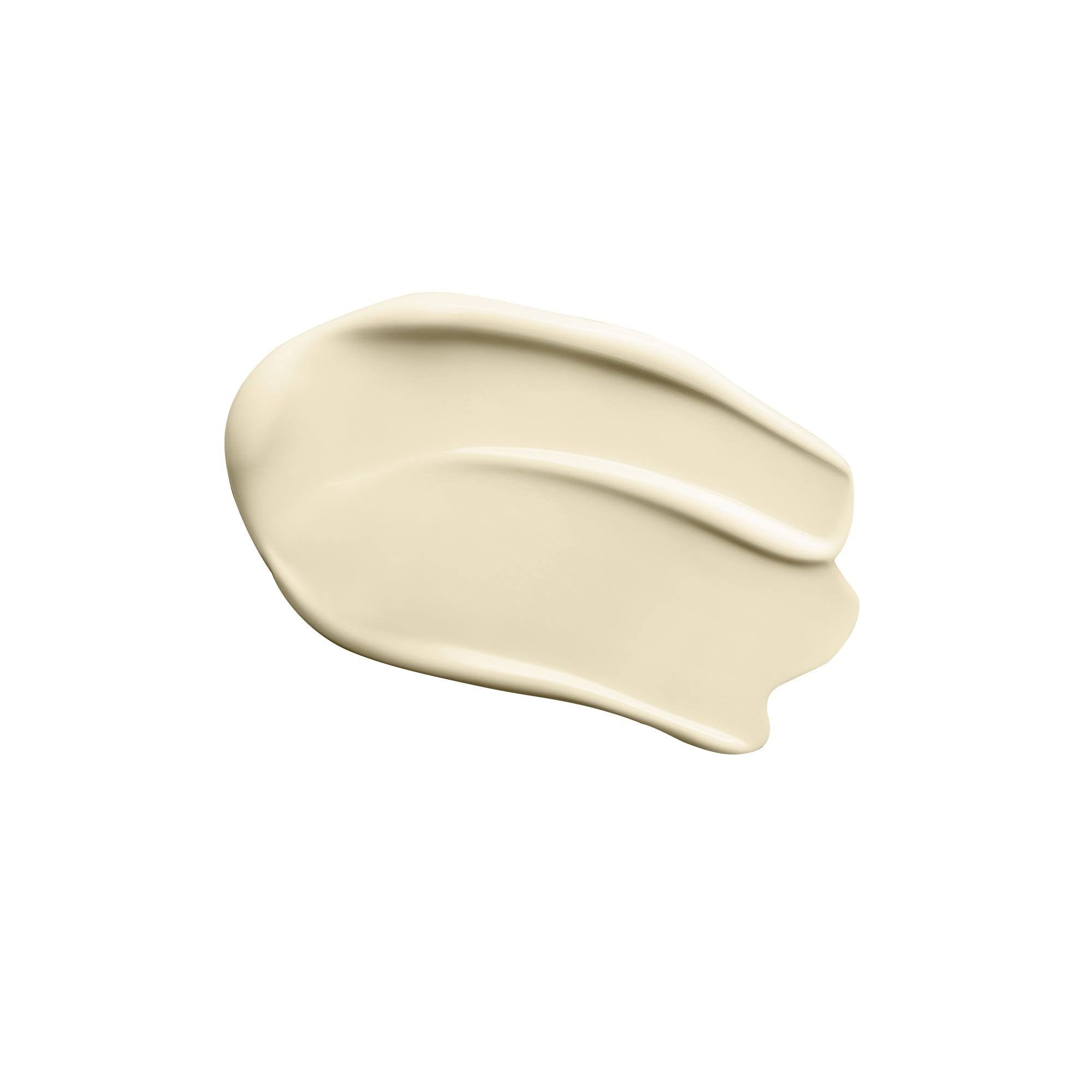 A white bottle of Augustinus Bader The Sunscreen with a blue box