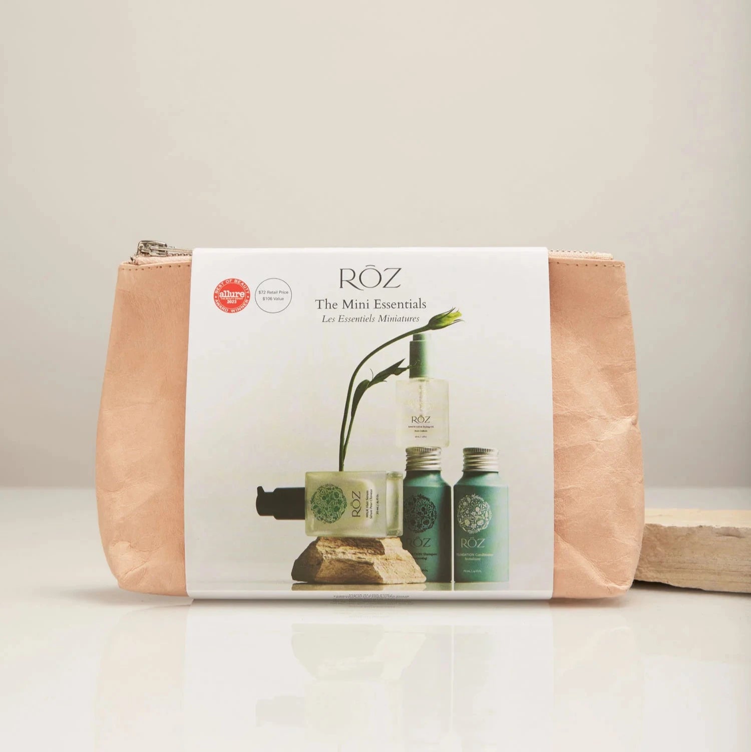 Cosmetic bag with Röz branding and product images on a beige background