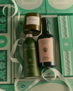 A Flamingo Estate Mini Garden Tour gift set includes a bottle of olive oil, euphoria hand soap, and an Adriatic muscatel candle