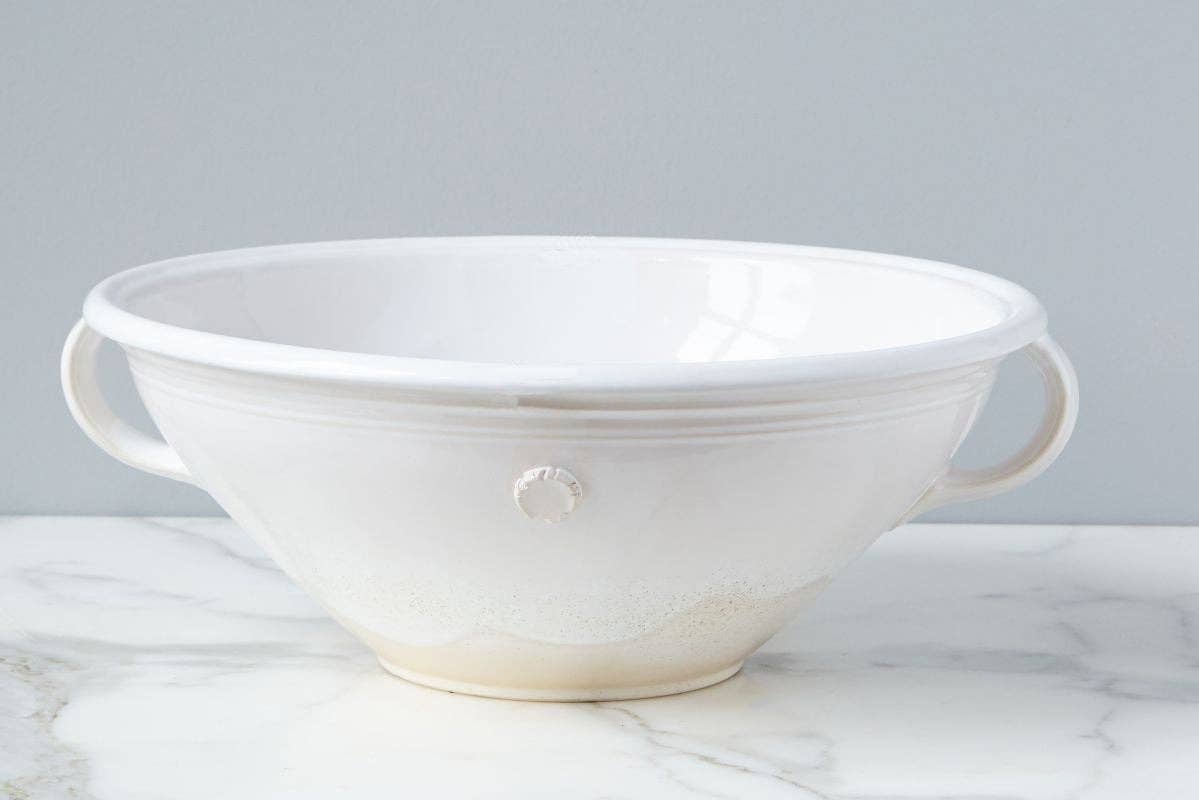 A white ceramic mixing bowl. 