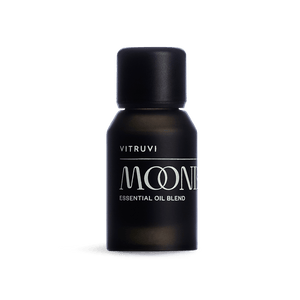 Black bottle of Vitruvi Moonbeam essential oil blend on a transparent background