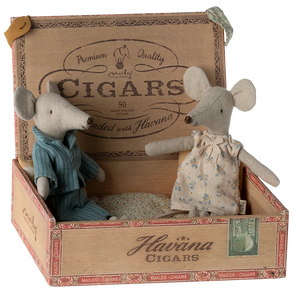 Two toy mice in a decorative cigar box with 'Havana Cigars' branding.