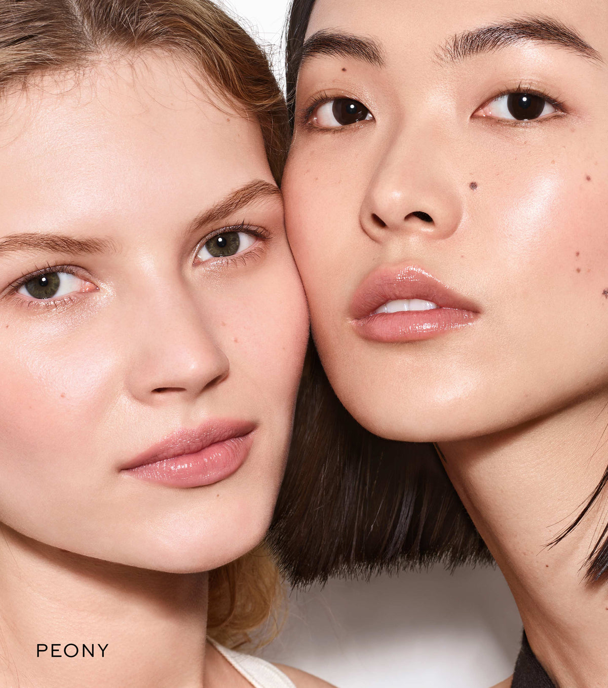 Close-up of two women's faces with a focus on skin texture and color, labeled 'PEONY'.