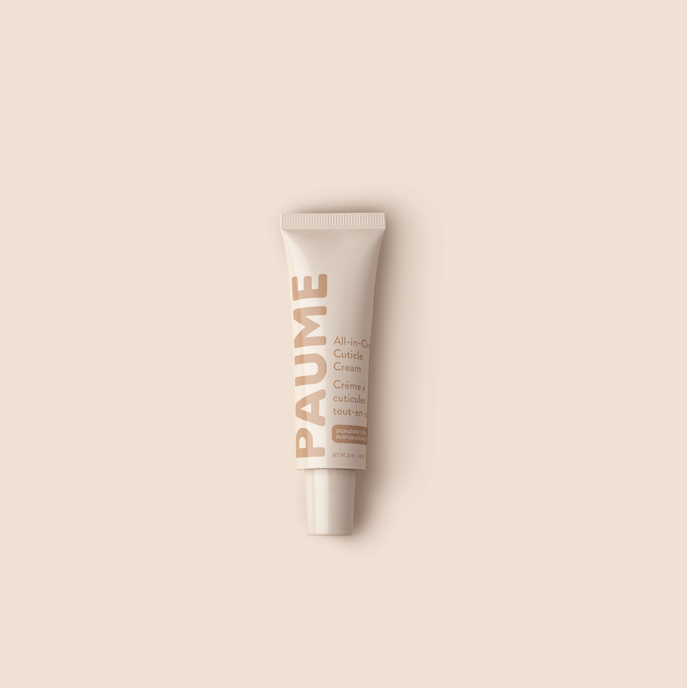 A tube of the Paume all in one nail and cuticle cream