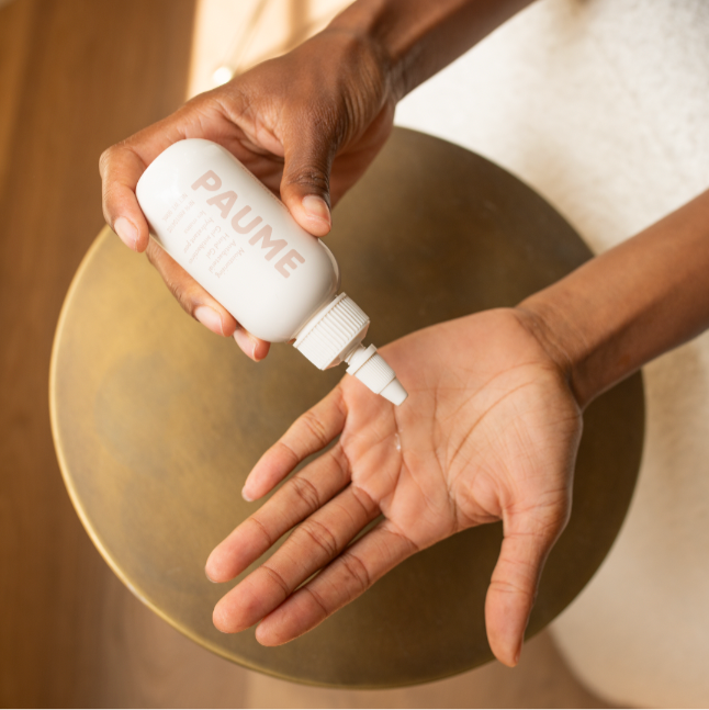 A bottle of the Paume moisturizing antibacterial hand gel