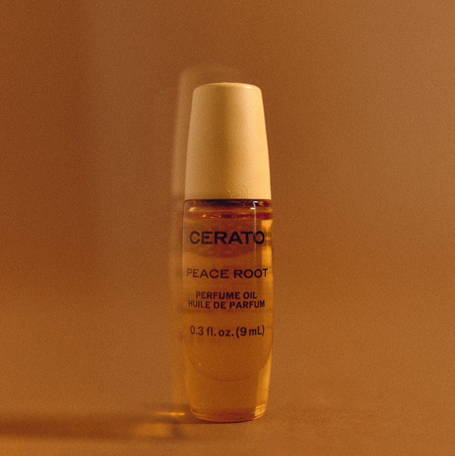 Cerato Peace Root perfume oil packaging on a white background
