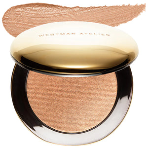 Westman Atelier bronzer compact with gold lid on a white background