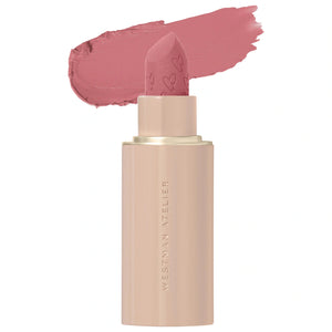 Lipstick with pink shade and Westman Atelier branding on a white background