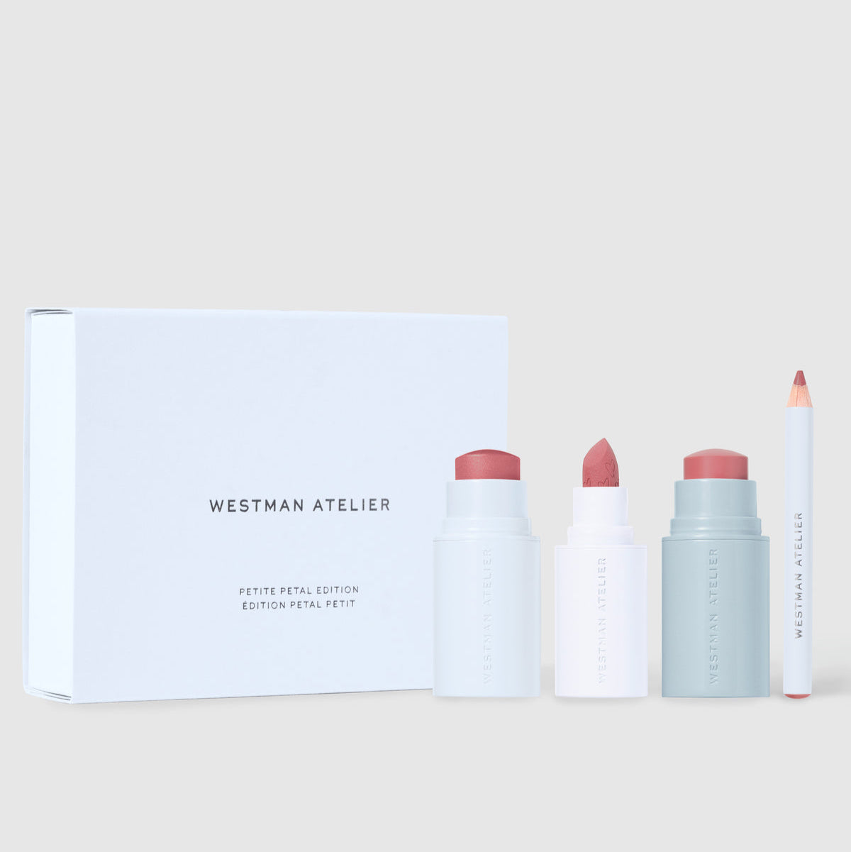 Westman Atelier lip balm set on a light background