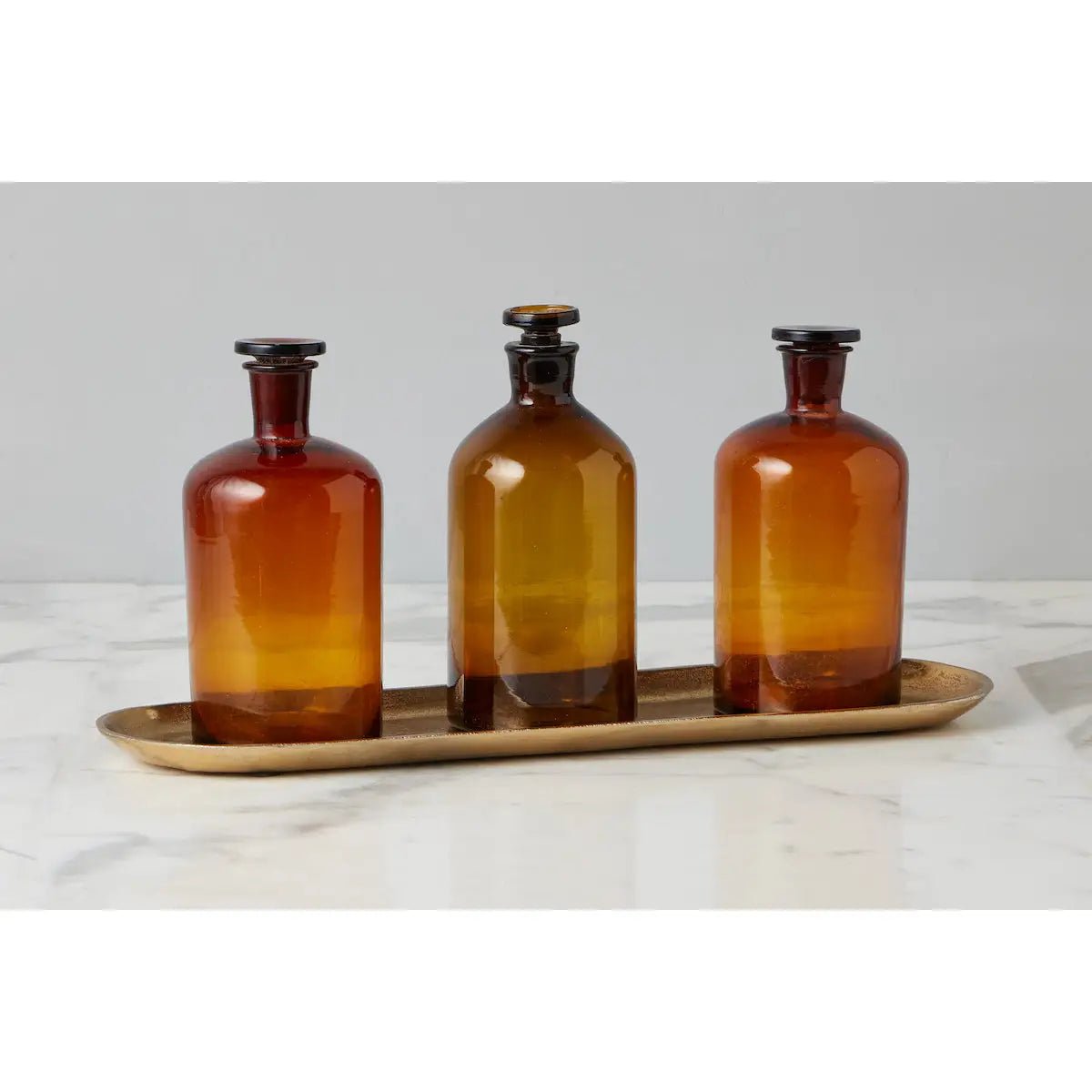 A set of three Found Amber Pharmacy Bottles, Set of 3 - Good Condition