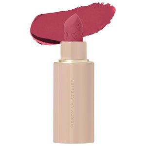 Lipstick with pink shade and visible brand name on a white background
