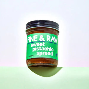 A jar of Fine and Raw sweet pistachio spread