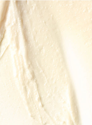 Close-up of smooth, light-colored cream or lotion texture