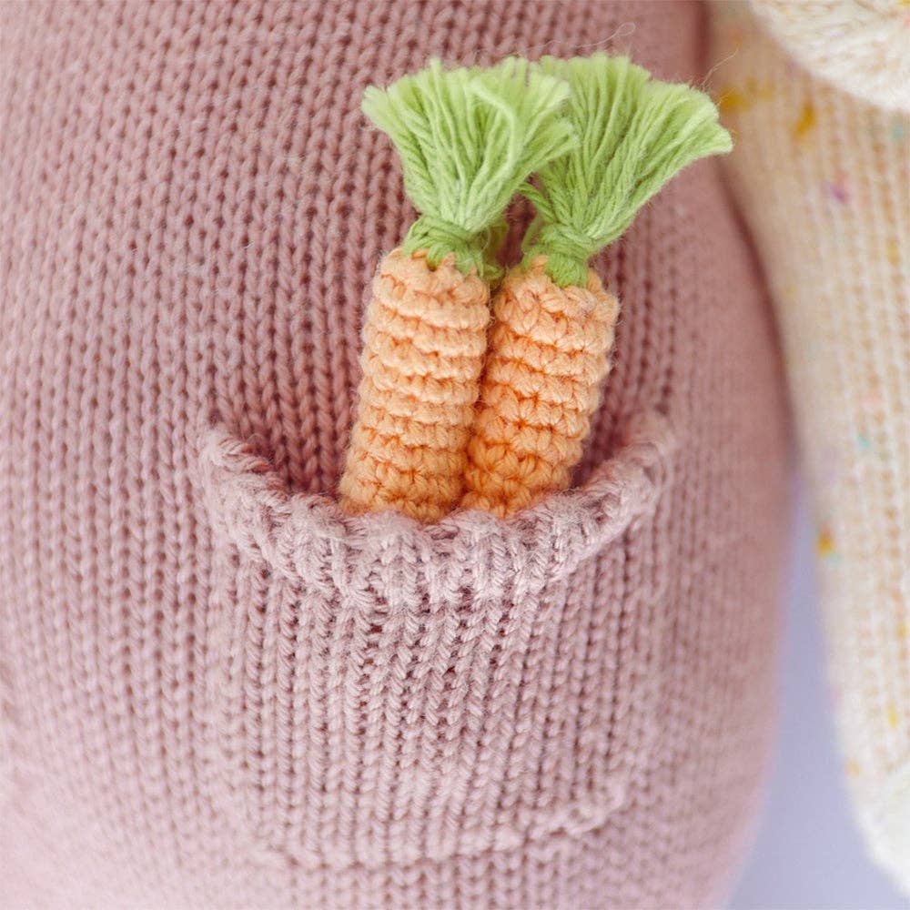 A detail of the knit carrots that are in Harper the bunny's pocket