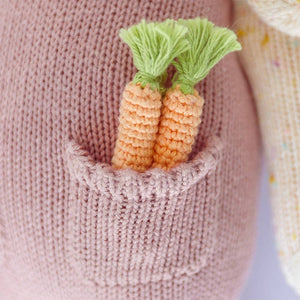 A detail of the knit carrots that are in Harper the bunny's pocket
