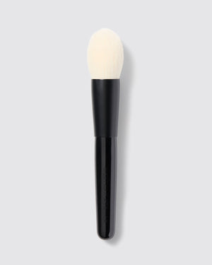 A tapered powder brush with a black handle and white bristles, designed for precise application of powder products.