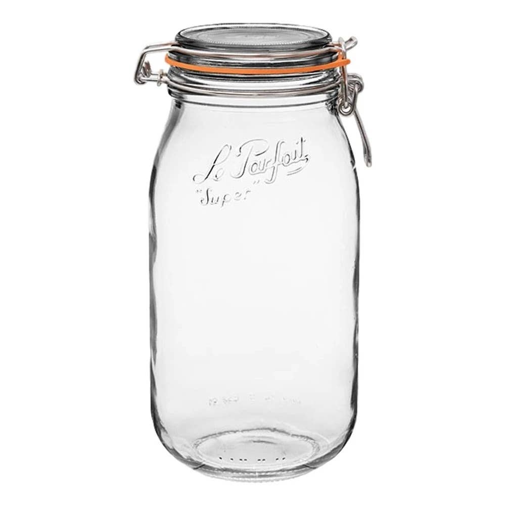 A clear glass Le Parfait preserving jar with a metal clasp and rubber seal.