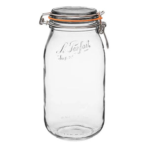 A clear glass Le Parfait preserving jar with a metal clasp and rubber seal.