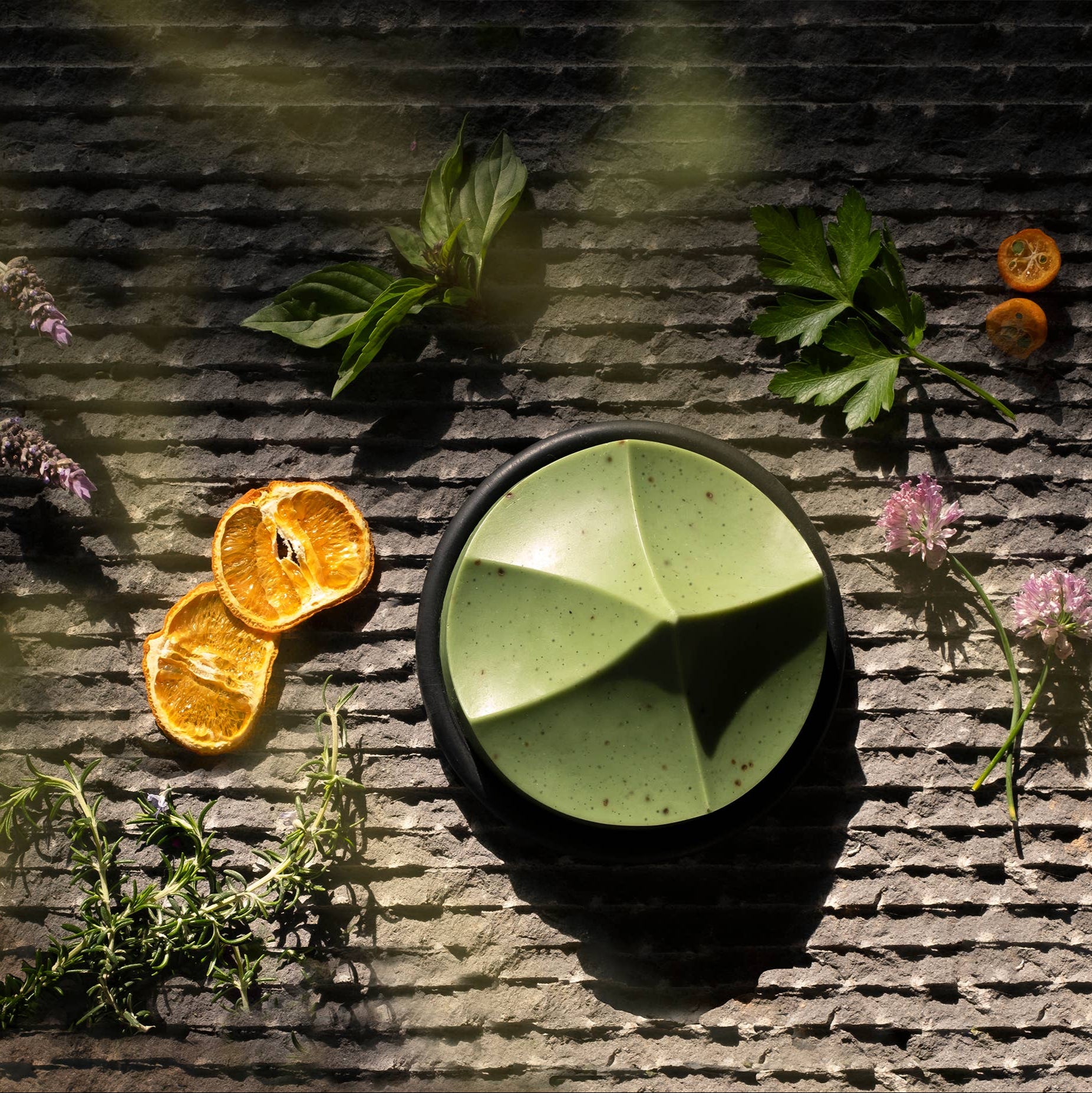 An ume studios erode soap and a black bouton. 