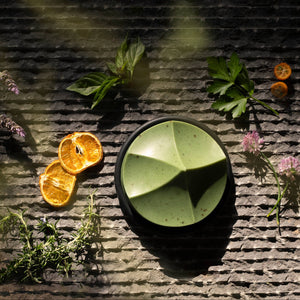 An ume studios erode soap and a black bouton. 