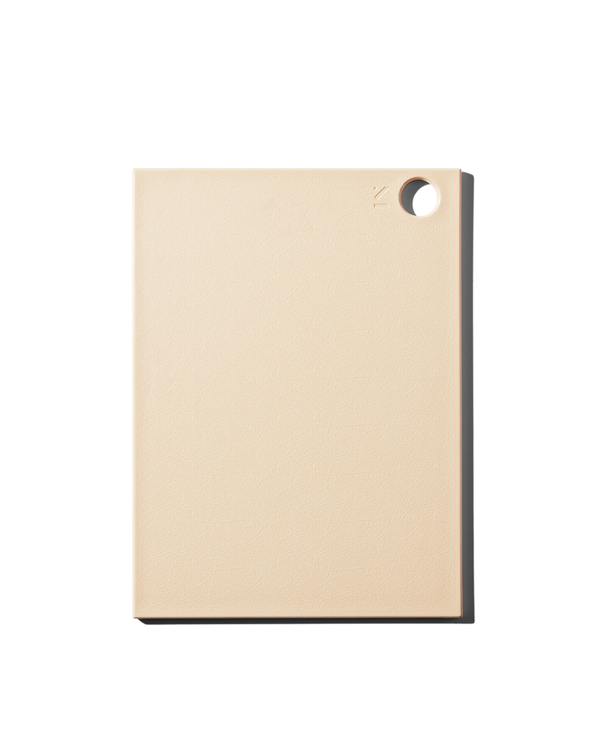 A beige reboard recycled cutting board. 