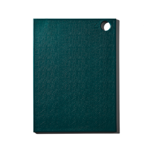 A solid teal recycled plastic cutting board with a textured surface and a small hole in the corner.