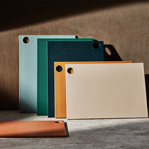 Six colorful reboard cutting boards. 