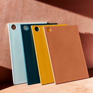 Four colorful reboard cutting boards. 