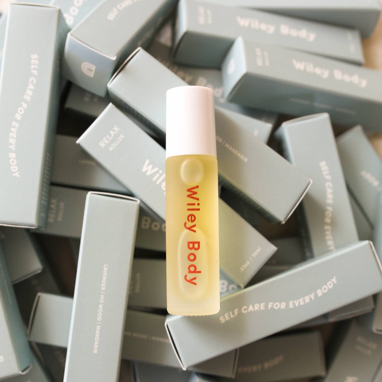 Blue boxes of Relax rollers with one relax roller on top. 