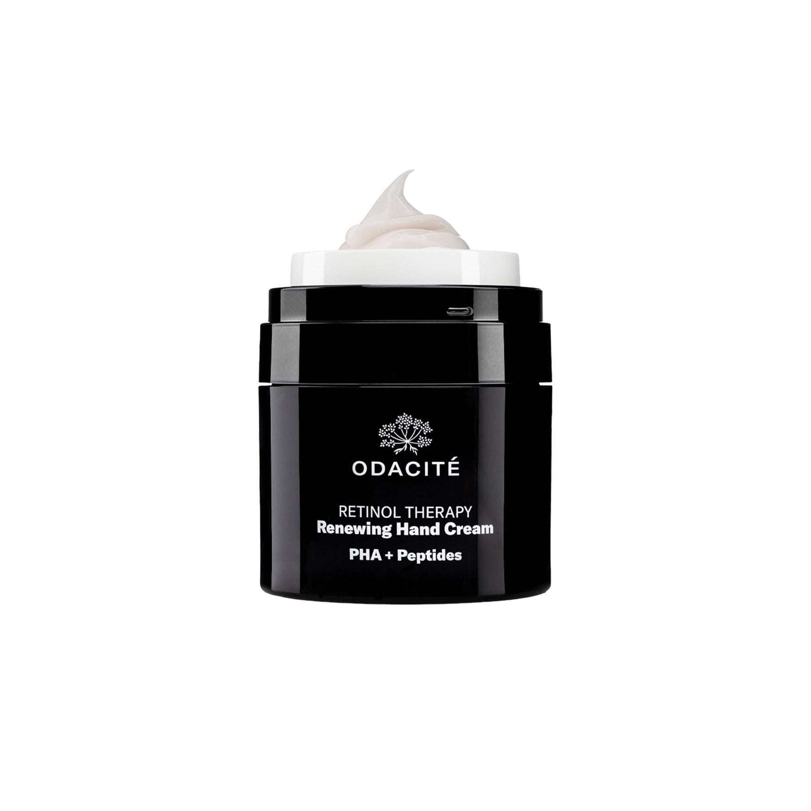 Black jar of Odacite hand cream with a white cap on a white background