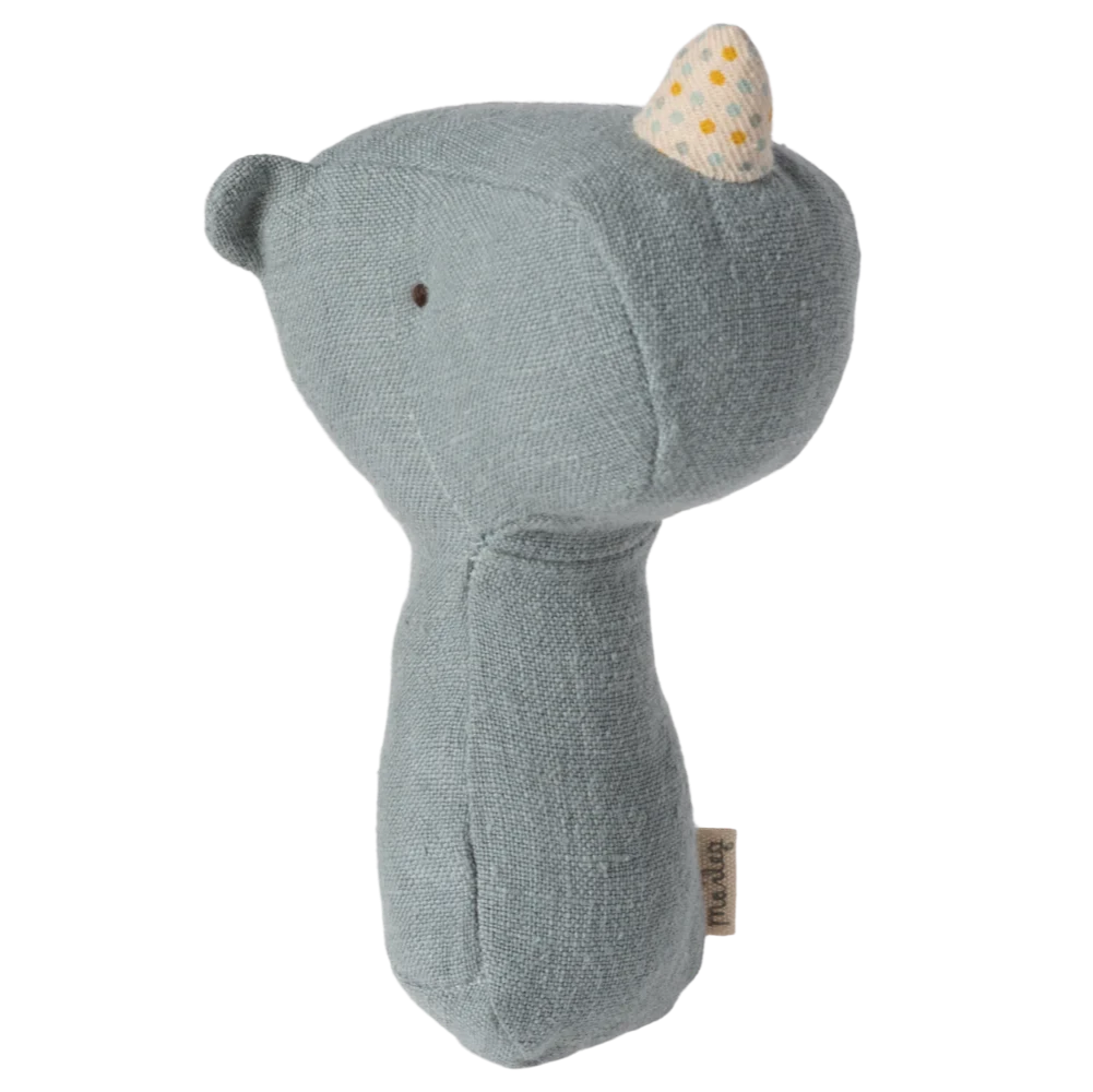 A soft gray Maileg Rhino rattle toy with a small star-shaped rattle on its head.