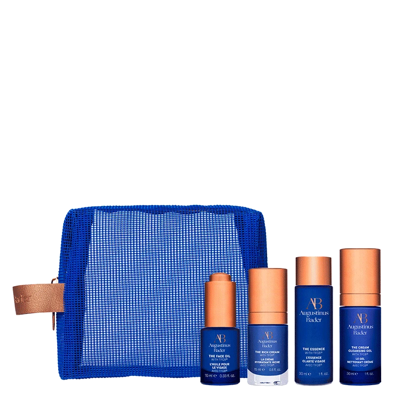 Set of skincare products with a blue pouch on a white background