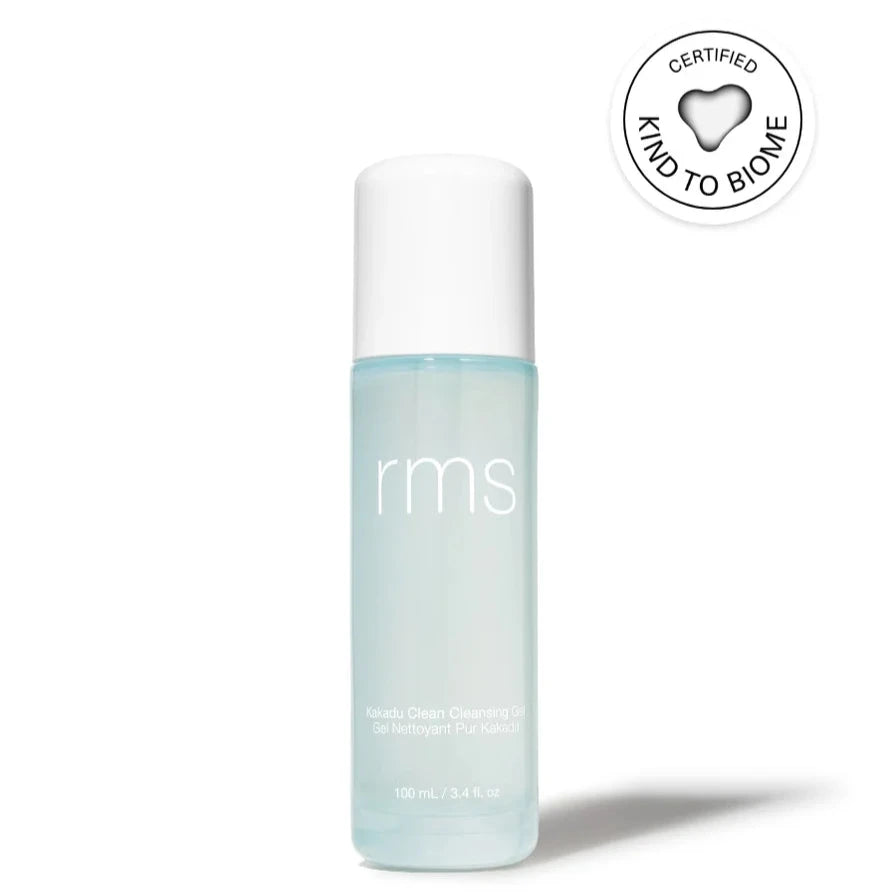 A light blue bottle of RMS Kakadu clean cleansing gel, with a white top