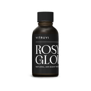 Vitruvi Rosy Glow natural air scent refill bottle on a white background