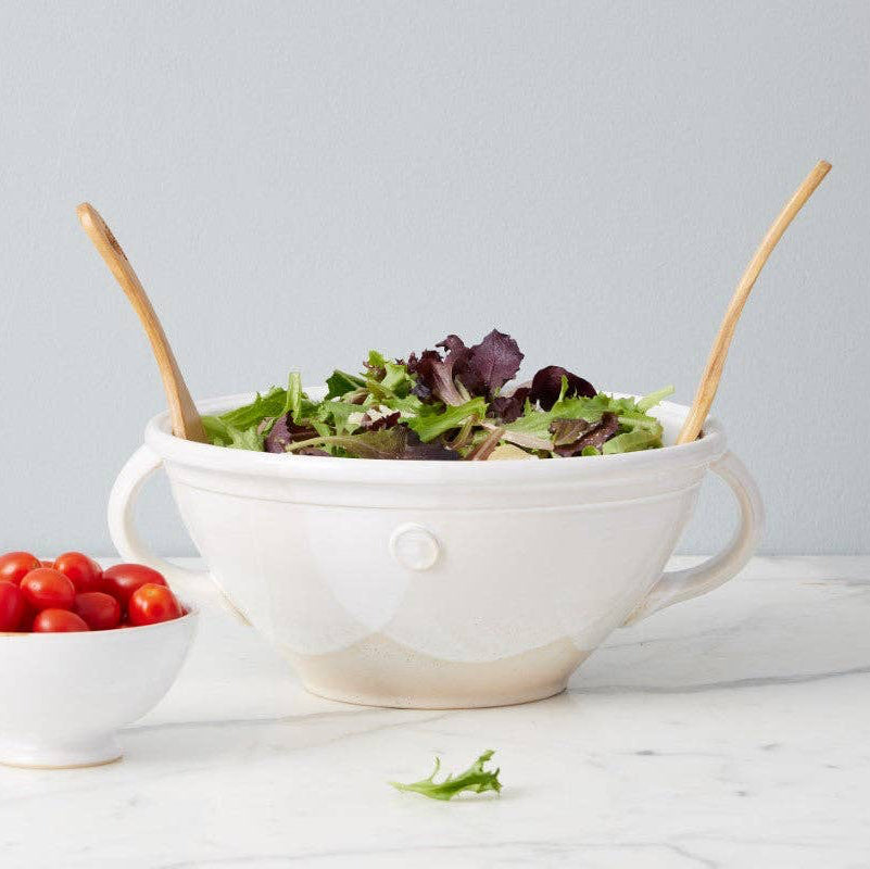 A white ceramic mixing bowl. 