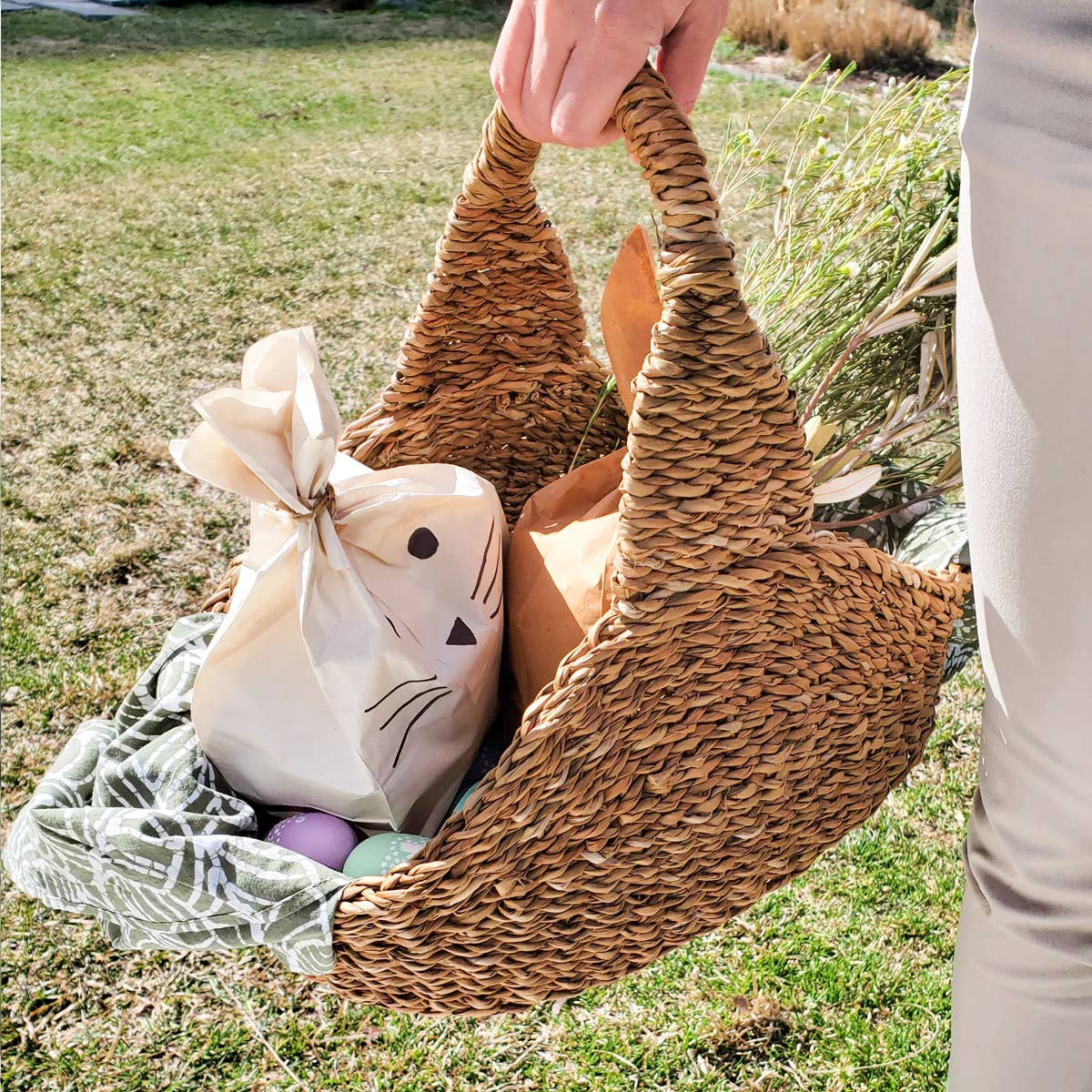 A brown Savar basket on a white background. 