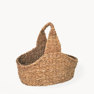 A brown Savar basket on a white background. 