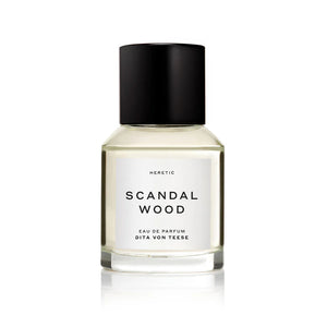 A bottle of Heretic Sandalwood perfume on a white background. 