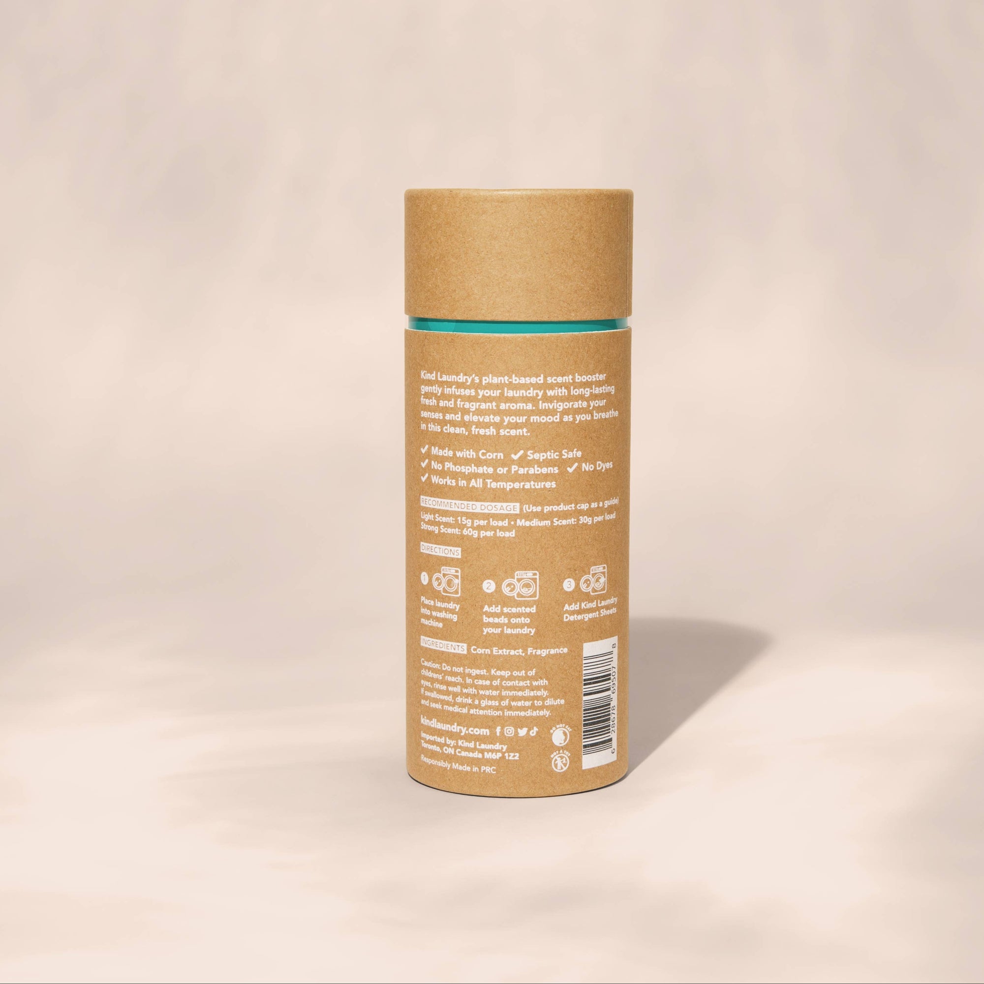 The back of a brown paper container of Kind Laundry scent boosters for laundry