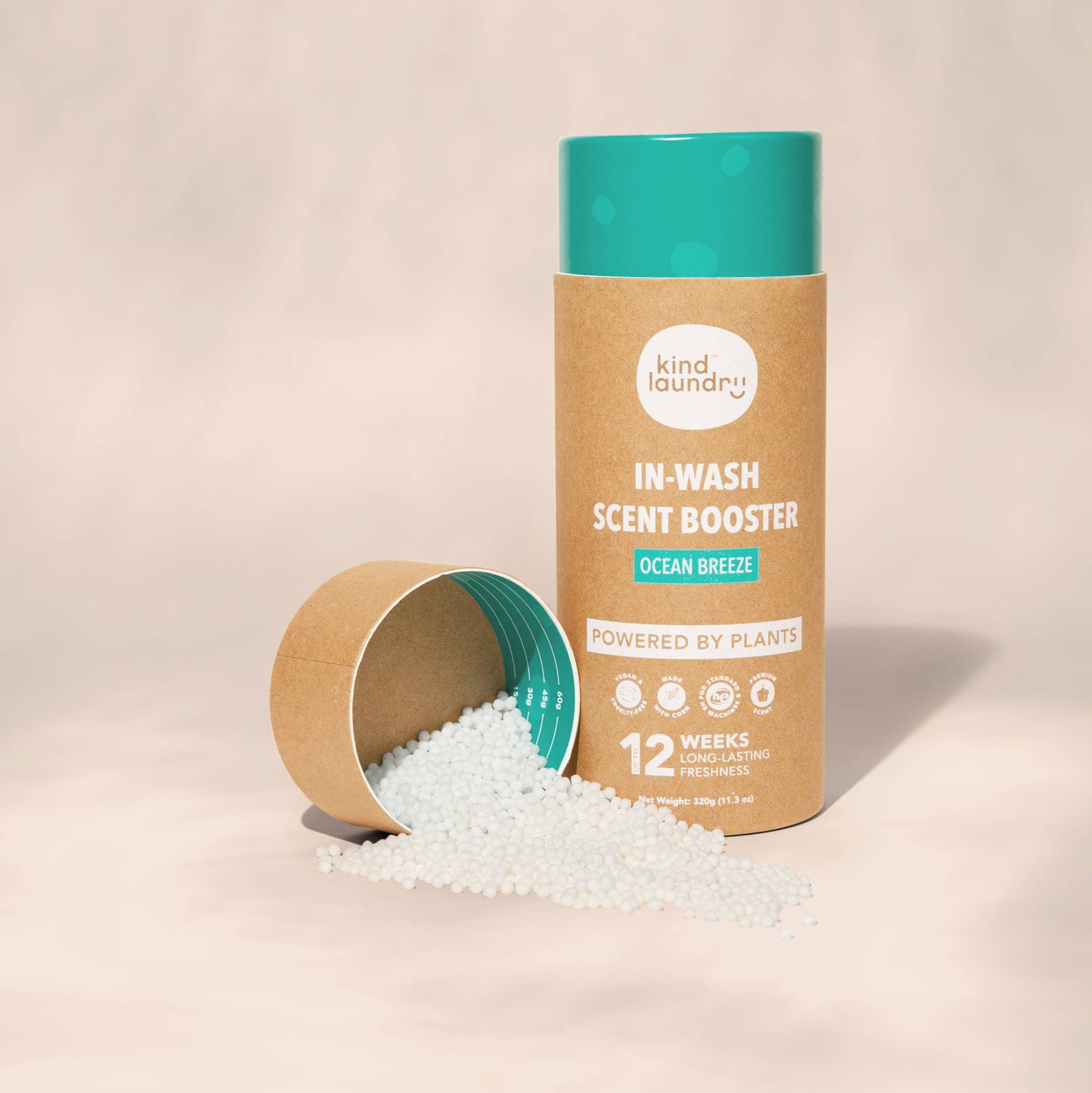 A bottle of Kind Laundry In Wash Scent Booster, in Ocean breeze