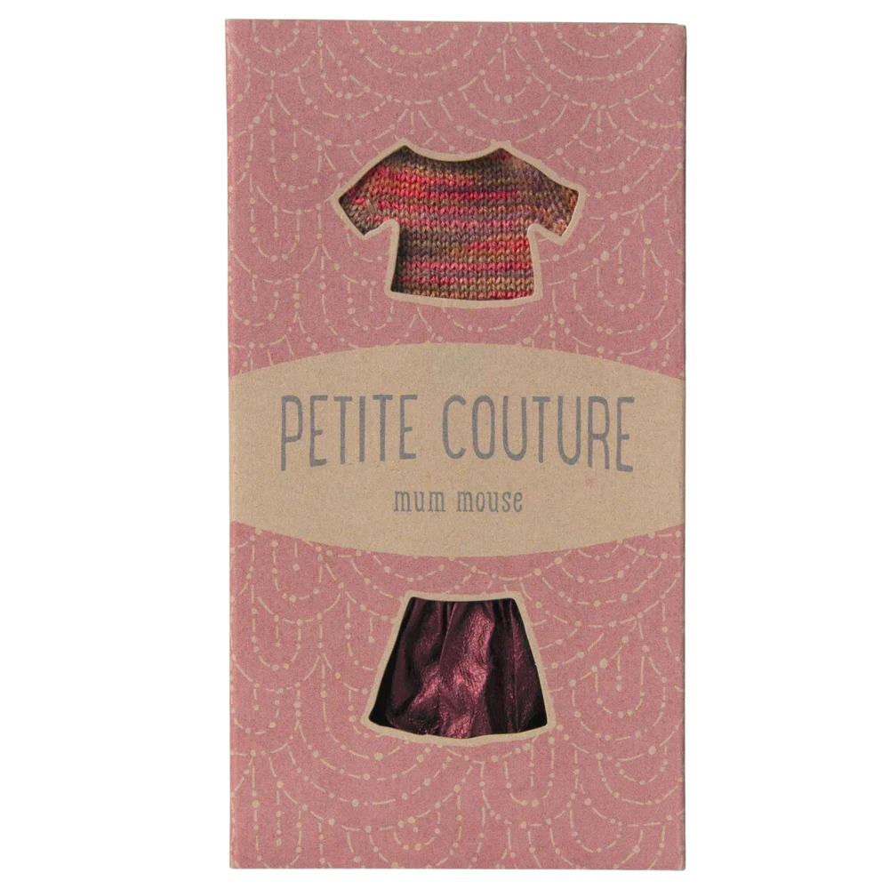 A pink box with Petite Couture Mum Mouse written on it, and a tiny outfit inside. 