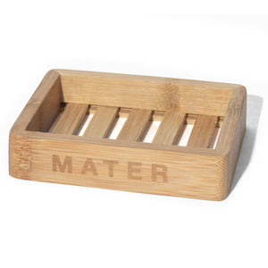 A rectangular bamboo soap dish with 'Mater' engraved on the side.