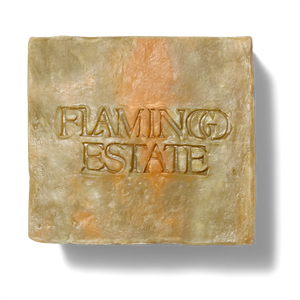 Bar of soap with 'Flaming Estate' branding on a white background