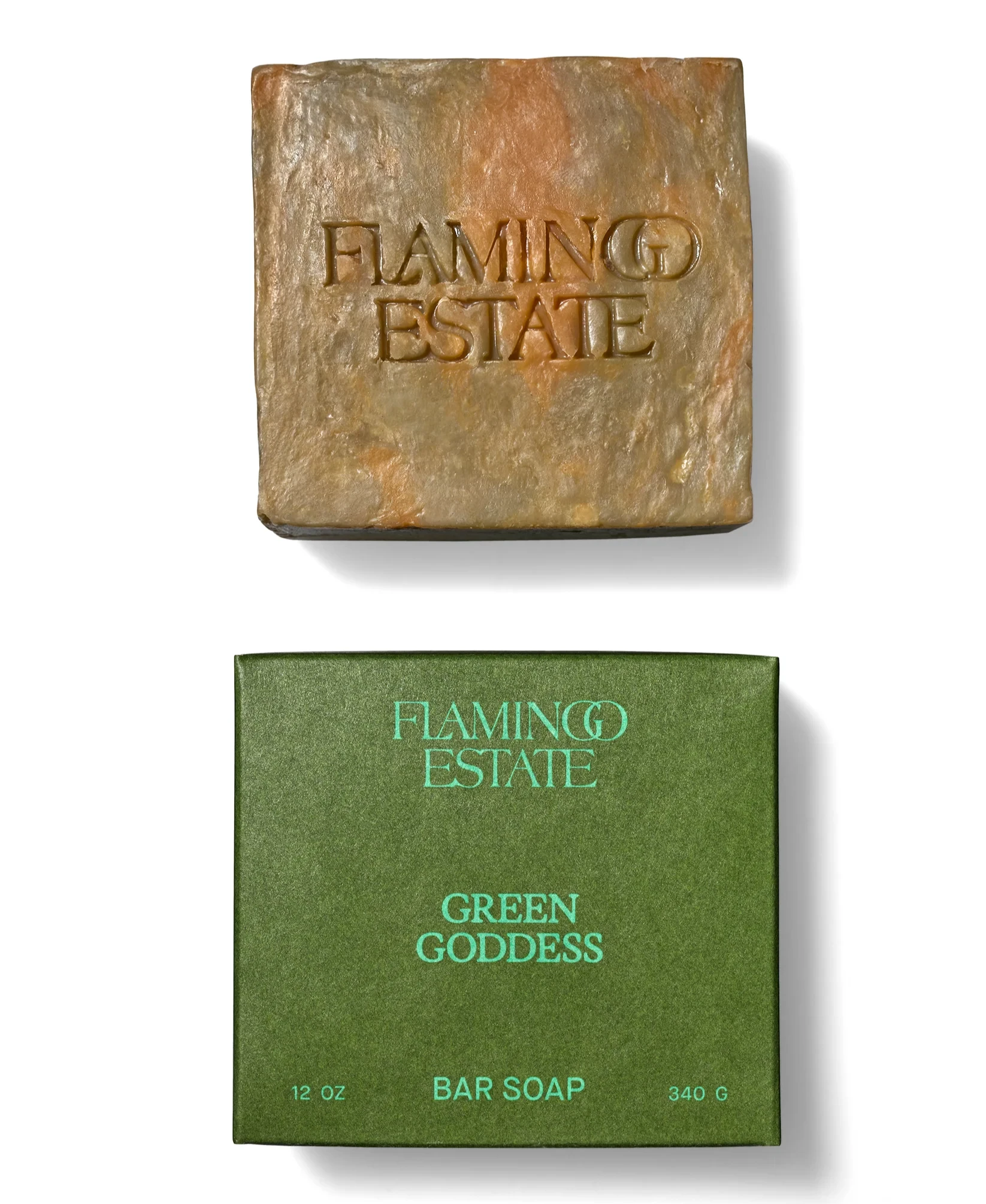Bar of soap and its packaging with 'Flamingo Estate' branding on a white background