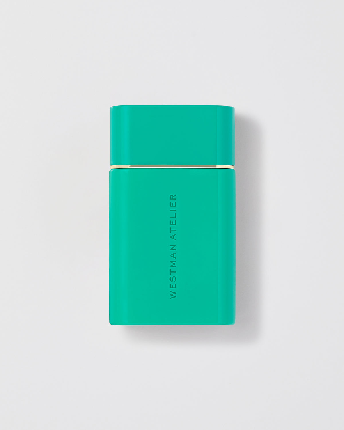Turquoise rectangular product with gold accent on a light gray background